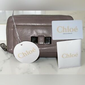 Chloé Lily long wallet in pink blush leather, signature metallic bow detail